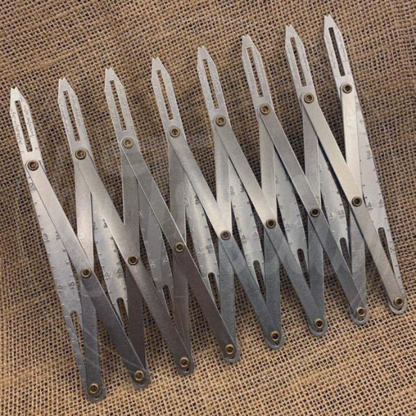 REGULADOR DE MEDIDA DE BOTONES Y OJALES