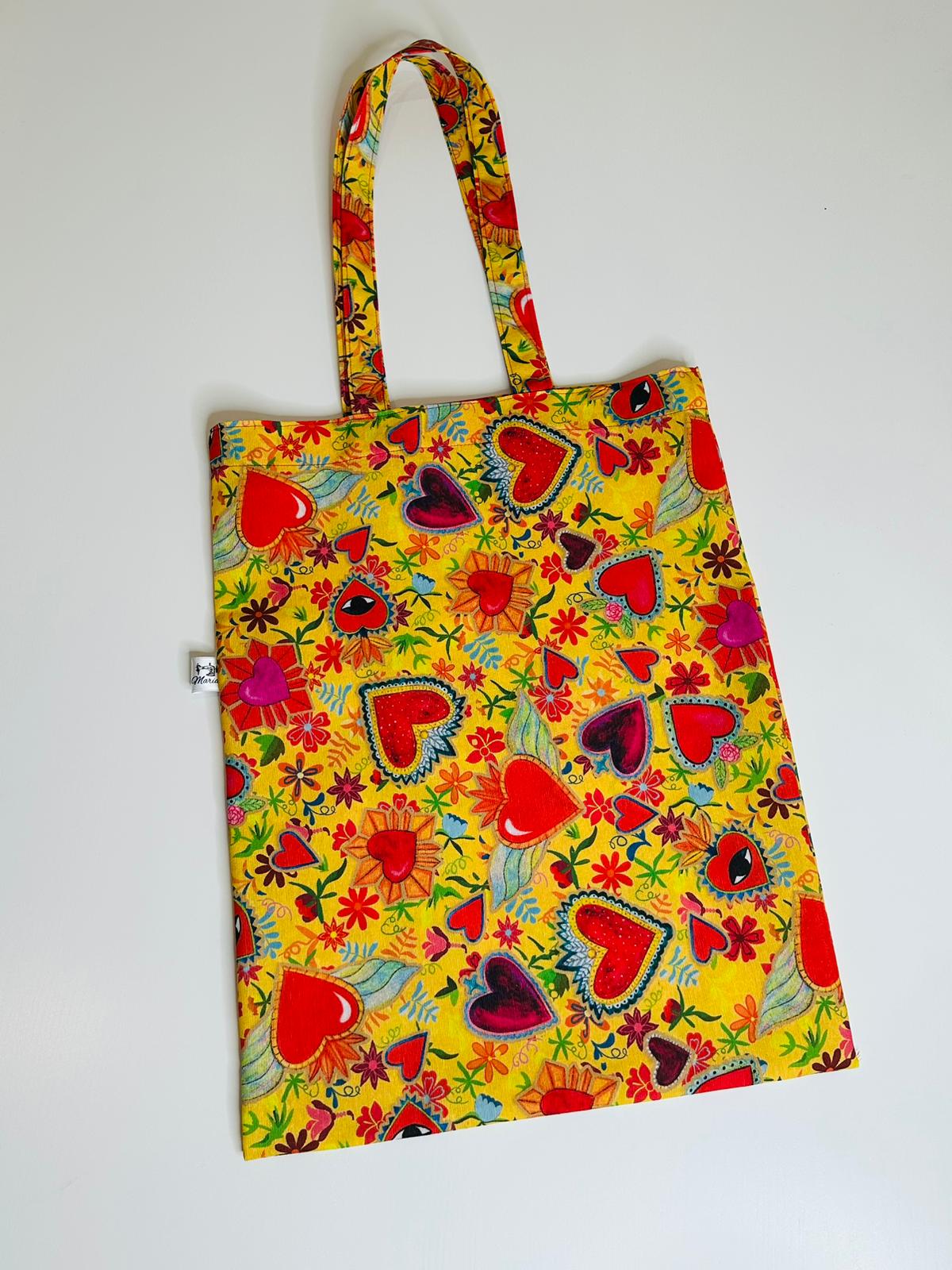TOTEBAG CORAZONES AMARILLA